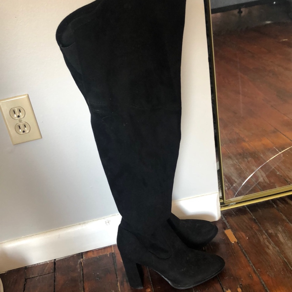 Thigh high black boots